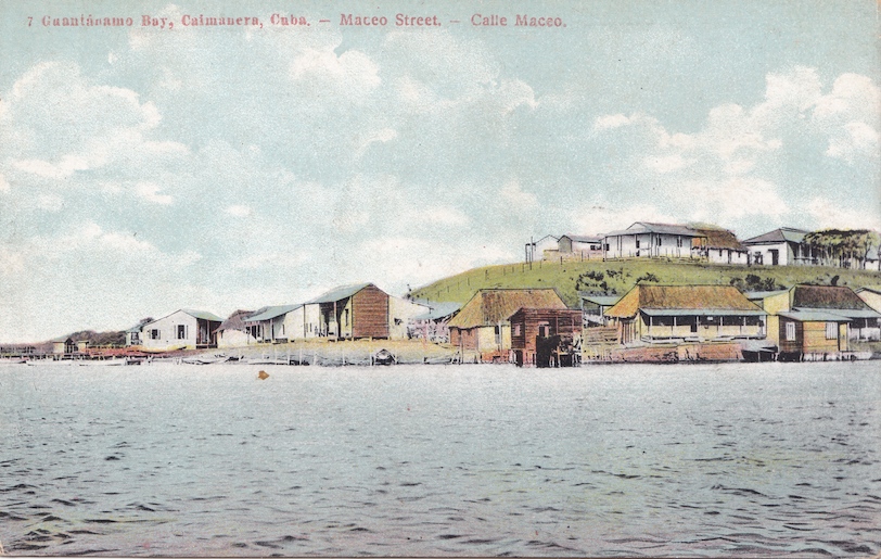 Guantánamo Bay, Caimanera, Cuba. -- Maceo Street. -- Calle Maceo. No publisher or photographer indicated. C. 1903-1920. Photomechanical print.